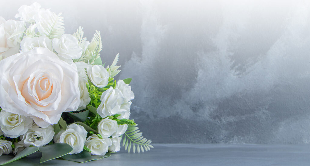 Celebrant Services | A white flower bouquet.